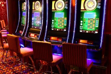 Roulette wheel spinning in Boom City studio with multiple camera angles displayed on tablet interface